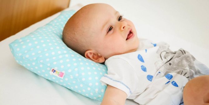 Pillow for a newborn in a crib